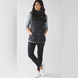 Lululemon Black Hooded Zip Up Puffer Vest with Detachable Hood.